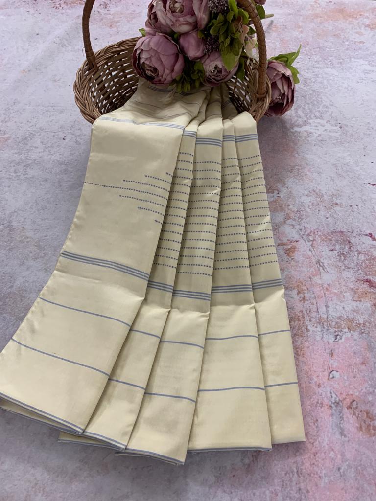Noil Silk temple border saree half white color
