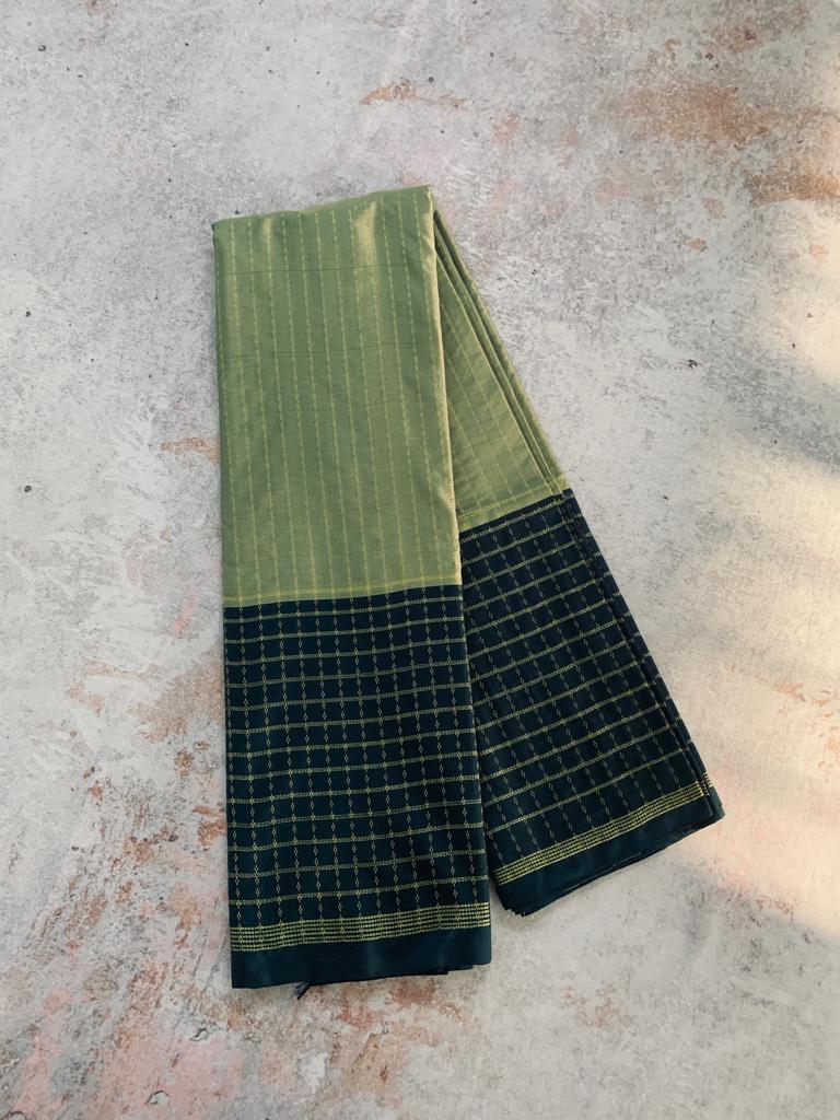 Noil Silk Checked Border sarees bottel green color