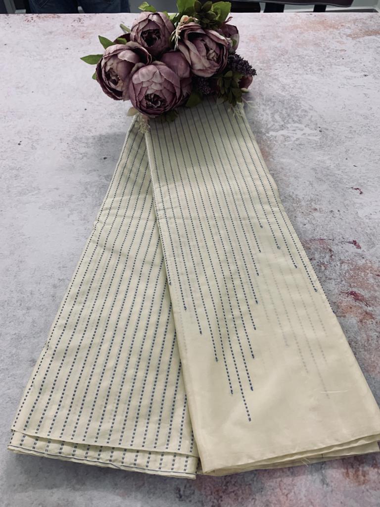 Noil Silk temple border saree half white color
