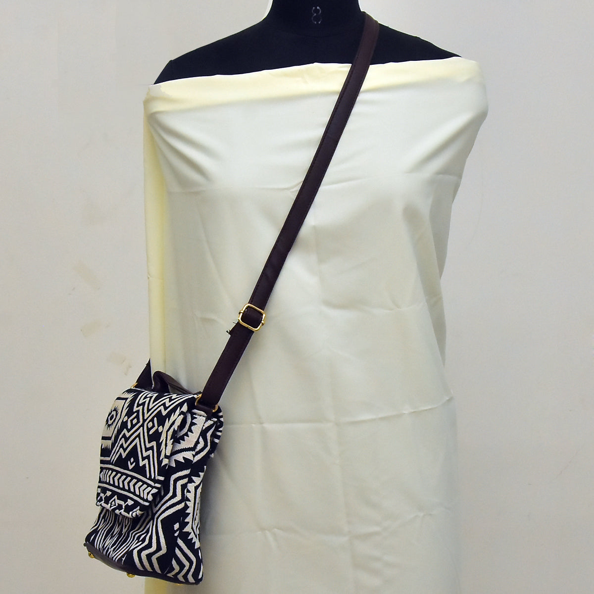 TVM01- Monochrome Chic: Black & White Jacquard Cloth and Leather Sling Bag