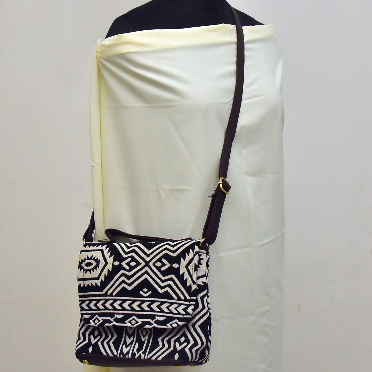 TVM01- Monochrome Chic: Black & White Jacquard Cloth and Leather Sling Bag